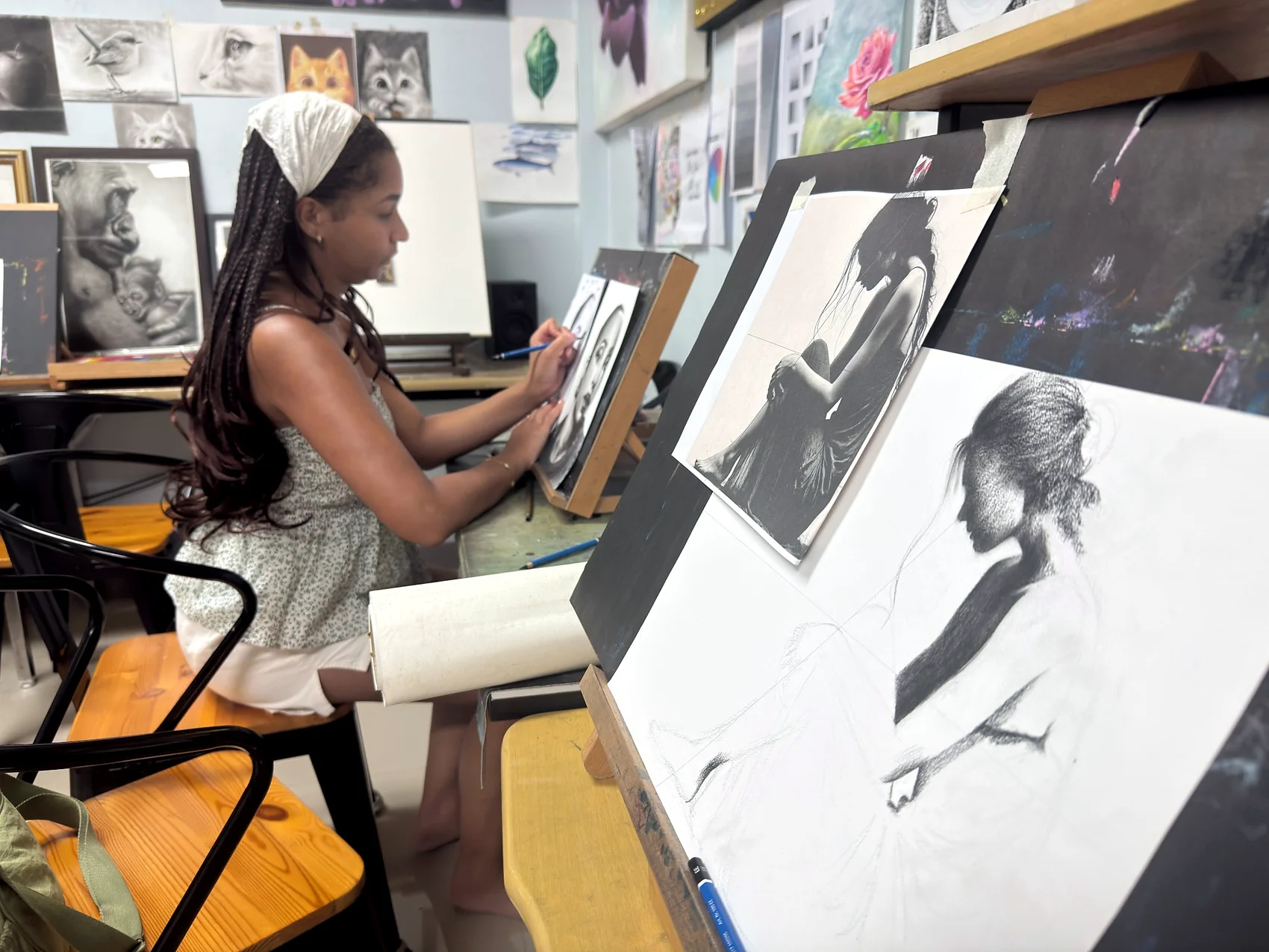 Student working on black and white drawing practice